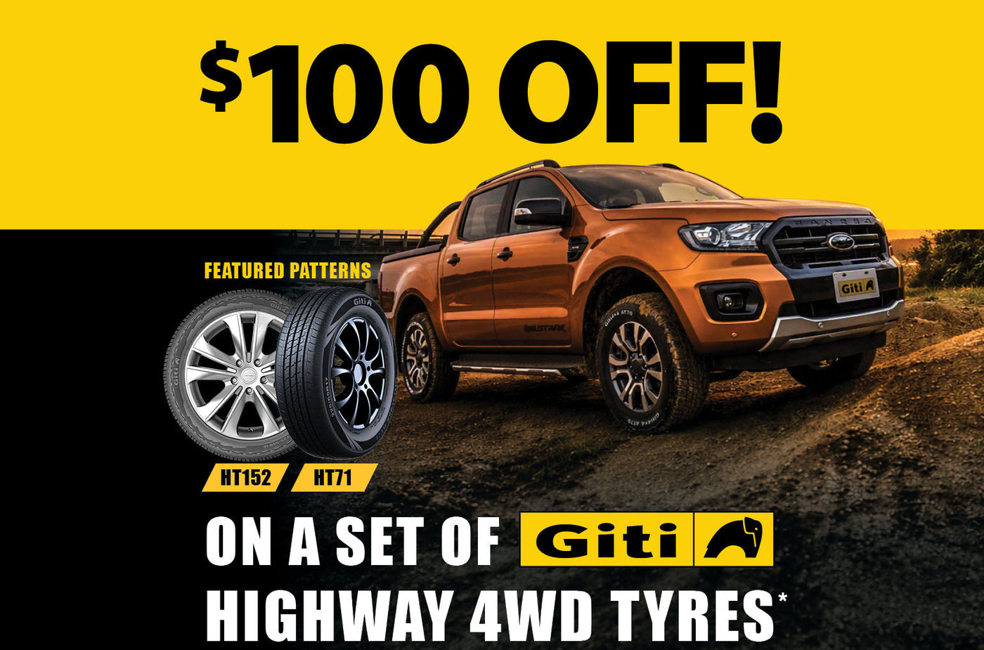 4WD tyre fitted on a dual-cab ute on a gravel road